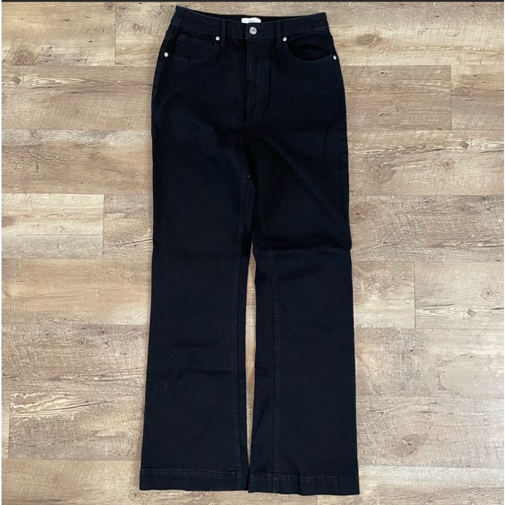 High waisted black straight leg jeans.